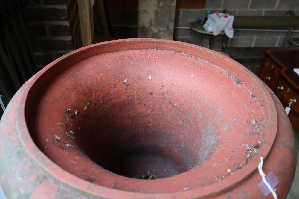 A Victorian terracotta campana garden urn on pedestal, urn 60cm diameter, total height 166cm